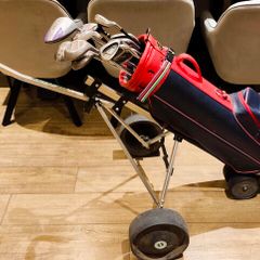 Golf Clubs with Golf Bag and Cart.