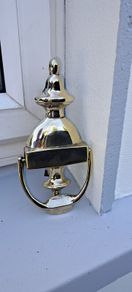 old brass door  striker