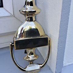 old brass door  striker
