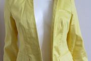 Yellow suit jacket from "Atmosphere"