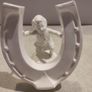 Rare find Cherub  Porcelain Horseshoe as flower vase held with child . Image 2