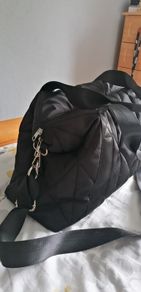 travel bag fits under seat fits in plenty  long strap and handles small inner zip pocket