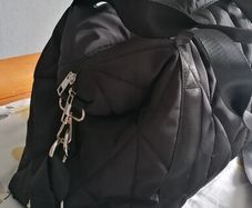 travel bag fits under seat fits in plenty  long strap and handles small inner zip pocket