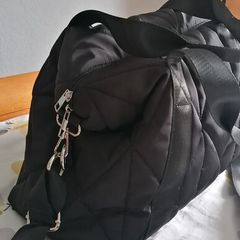 travel bag fits under seat fits in plenty  long strap and handles small inner zip pocket