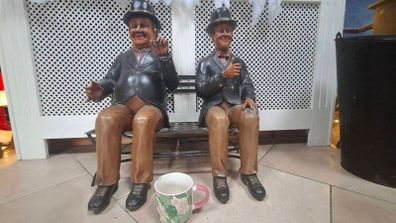 Laurel & Hardy Figures On Bench