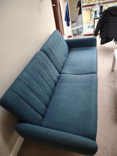 Blue fabric sofa bed