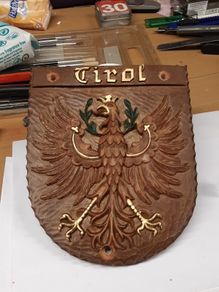 Tirol family crest plaque