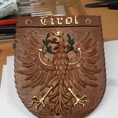 Tirol family crest plaque