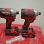 2 Milwaukee impact drivers with batteries Image 3