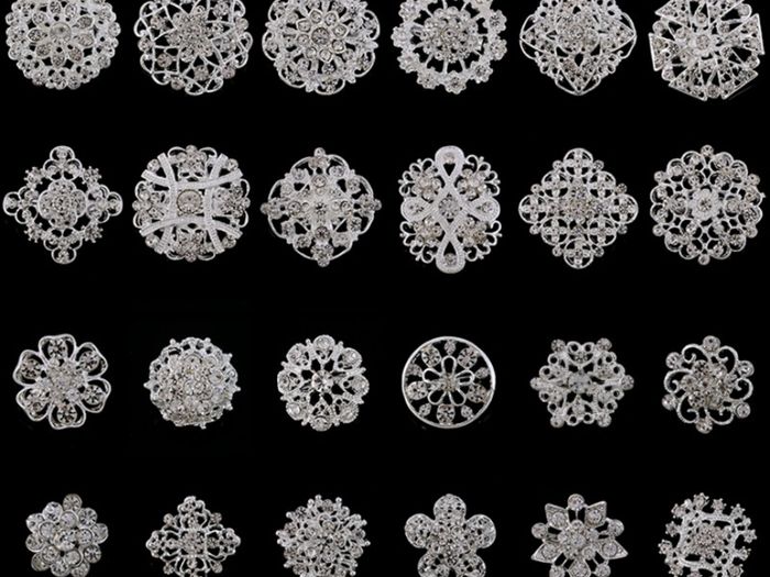 24 Silver Brooches
