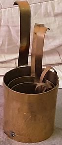vintage brass measuring jugs