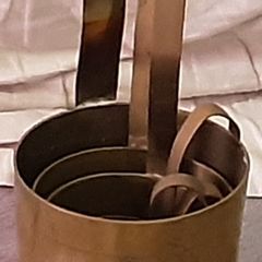 vintage brass measuring jugs