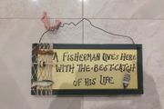 Fisherman sign