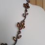 Victorian revival aesthetic  dark antiqued metal with warm amber tones Image 5