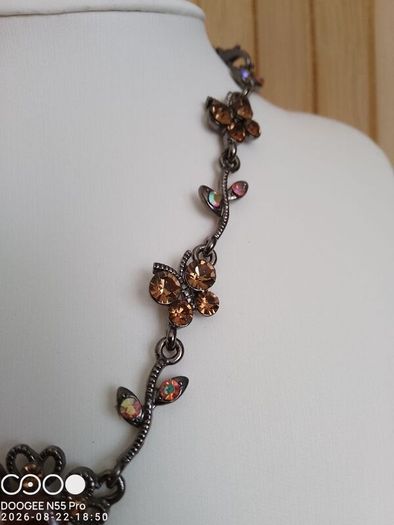 Victorian revival aesthetic  dark antiqued metal with warm amber tones