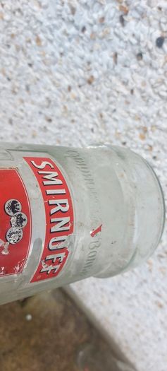 Smirnoff volka 3 litre bottle ,,with cork ,nice patina condition, handy for 1 or 2 euro coins ,etc ,,or display advertising item for home bar etc ,sold as is,