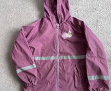 Good condition fleece lined raincoat 6-8 yrs