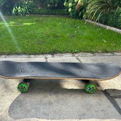 Oxelo Play 3 skateboard, Swaggydog design, green wheels