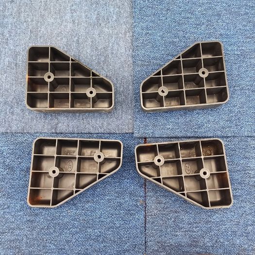 4 black hard plastic  sofa legs