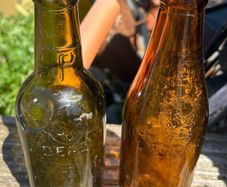 2  Vintage half pint glass Cork Advertising Bottles