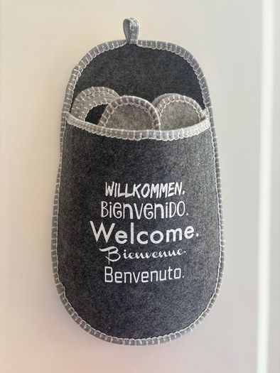 Felt guest slippers set with hanging wall organiser