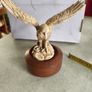 Varnished Resin Golden Eagle Figurine On Wooden Round Plinth. Image 8