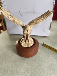 Varnished Resin Golden Eagle Figurine On Wooden Round Plinth.