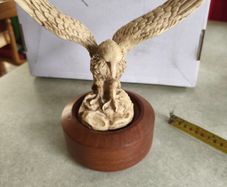 Varnished Resin Golden Eagle Figurine On Wooden Round Plinth.