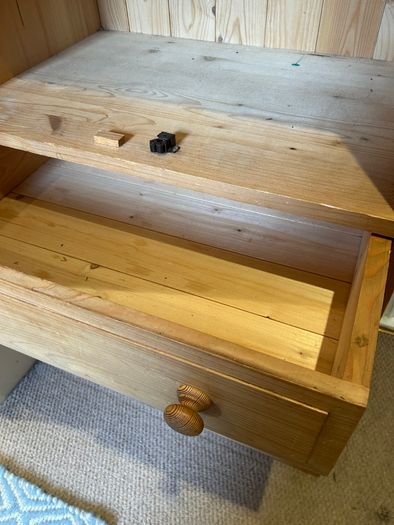 Solid pine shelving unit with three drawers