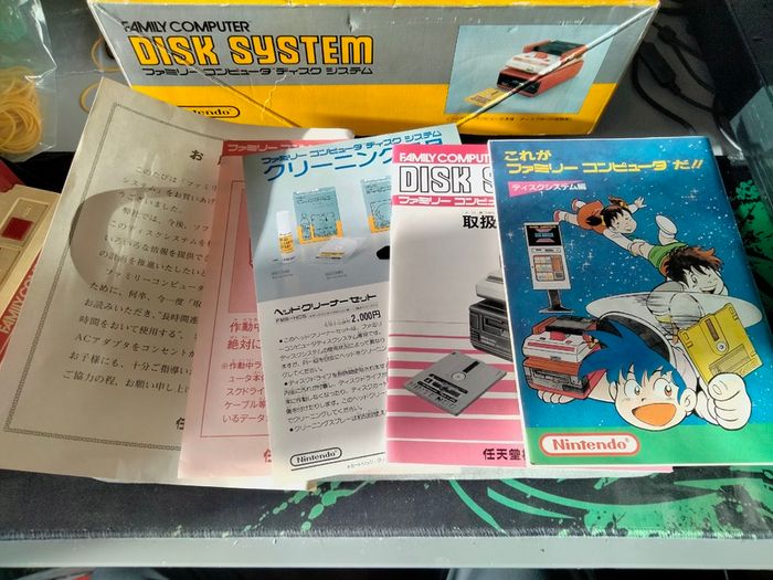 Boxed Famicom Disk System + games