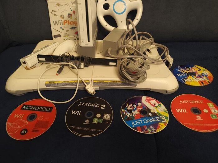 Wii + balance board, Mario kart, steering wheel, dance games