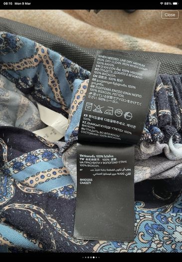 skirt paisley print asymmetrical hemline skirt H&M size small 10/12