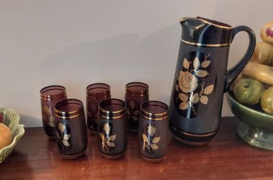 Fabulous Vintage Retro Mid-Century-Modern Hand Blown Tall Glass Pitcher with Six Matching Glasses in Purple/Amethyst Glass with Rose Pattern and Rose Gold Gilt Banding and Frosted Effect