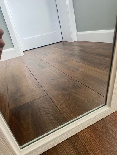 Mirror with boat detail
