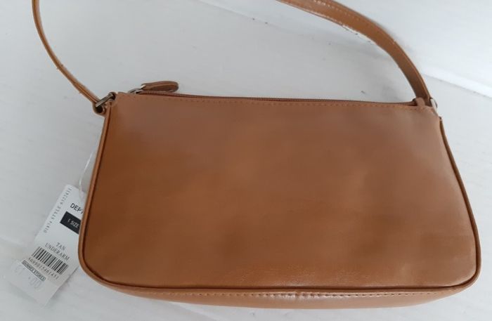 New small bag tag attached