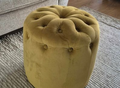 Gold velvet buttoned footstool