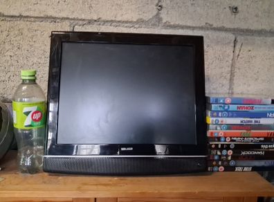 Small tv and dvd combo with 12 dvds