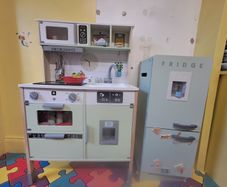Toy kitchen nd fridge