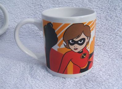 THE INCREDIBLES (Disney/Pixar) - a child's ceramic mug featuring Mr. Incredible and Elastigirl (c.2004)