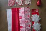Christmas tissue paper, ribbon, bows and gift tags