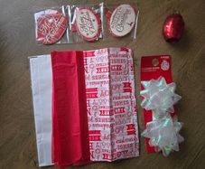 Christmas tissue paper, ribbon, bows and gift tags