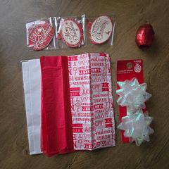 Christmas tissue paper, ribbon, bows and gift tags