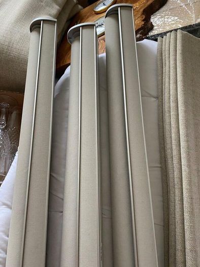 3 elegant roller blinds with open cassette pelmet.