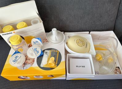 Medela Swing Breast Pump + Extras