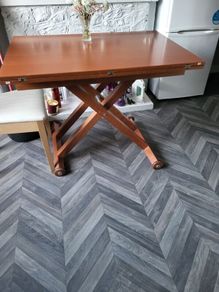 Table convertible to coffee table