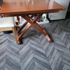 Table convertible to coffee table
