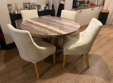 marble round dining table. And chairs