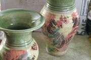 Set of 2 Vaseses been market is associated with Fermoyle Pottery, which is based in County Kerry, Ireland. Fermoyle Pottery often collaborates with the design studio