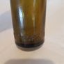 Woodford bourne co Ltd cork bottle,,little chip on rim see condition,,collectors item, price includes post to anywhere in ireland thank you,take as is. Image 5