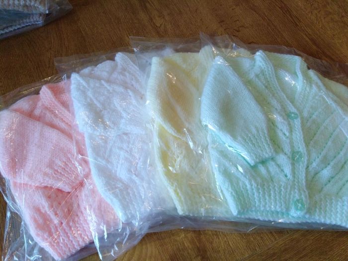 Beautiful hand knitted baby cardigans